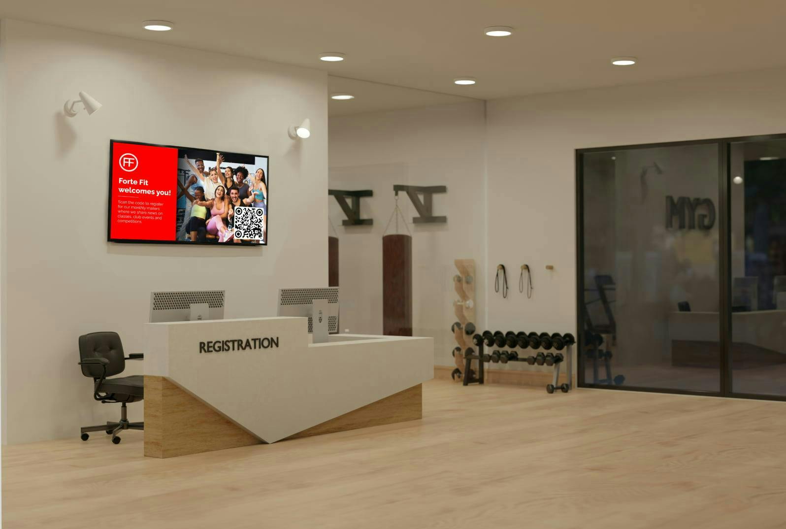 welcome board digital signage at a fitness center reception