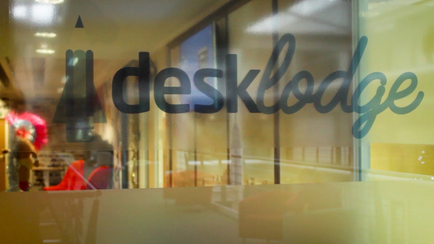 ScreenCloud Article - How Desklodge Strengthened the Members Community in Its Co-Working Spaces Using Digital Signage 